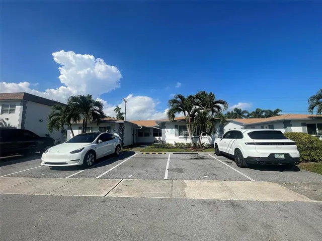 a car parked in front of a house