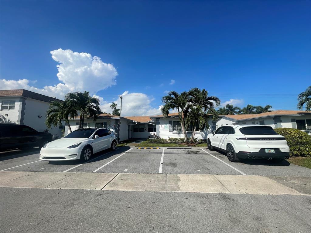 a car parked in front of a house