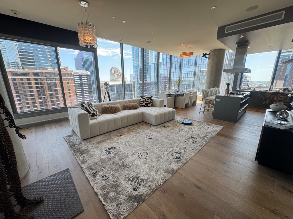 210 Lavaca Street, Unit 2312 Austin, TX 78701 - Photo 1 of 1 a living room with furniture and a large window