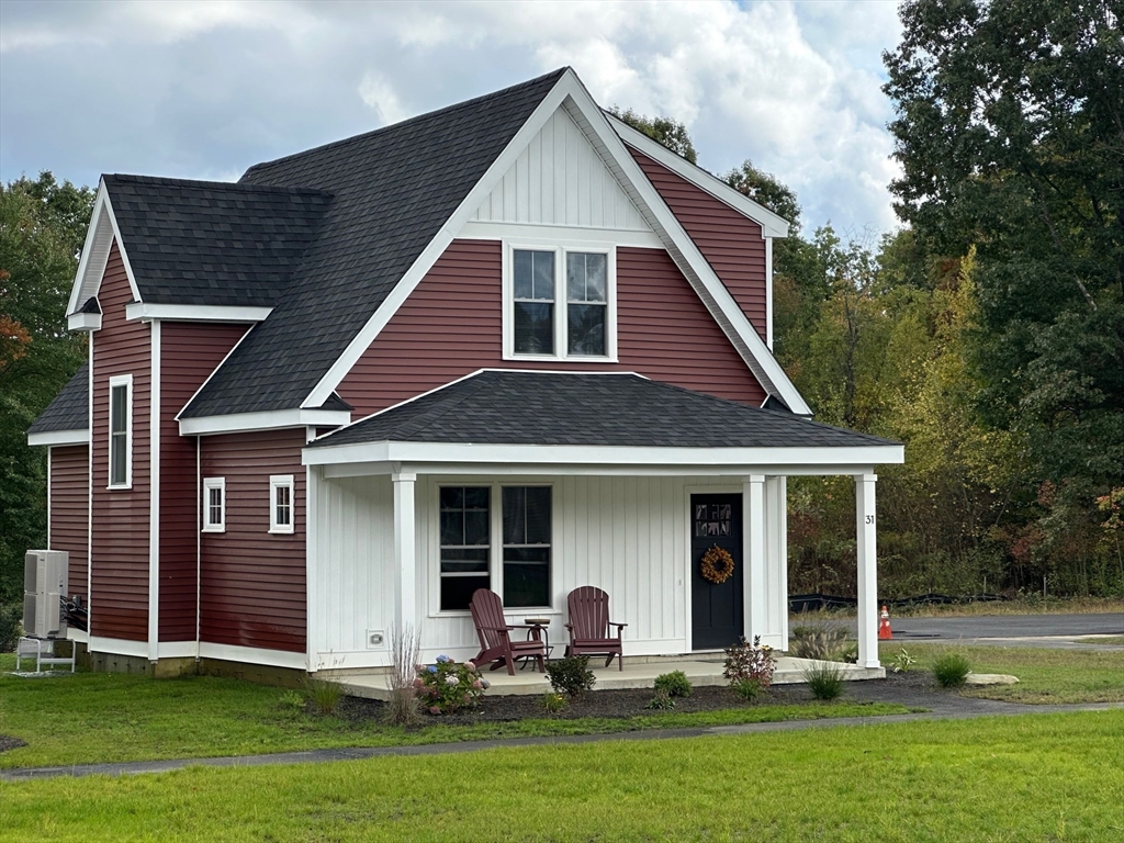 a front view of house with yard