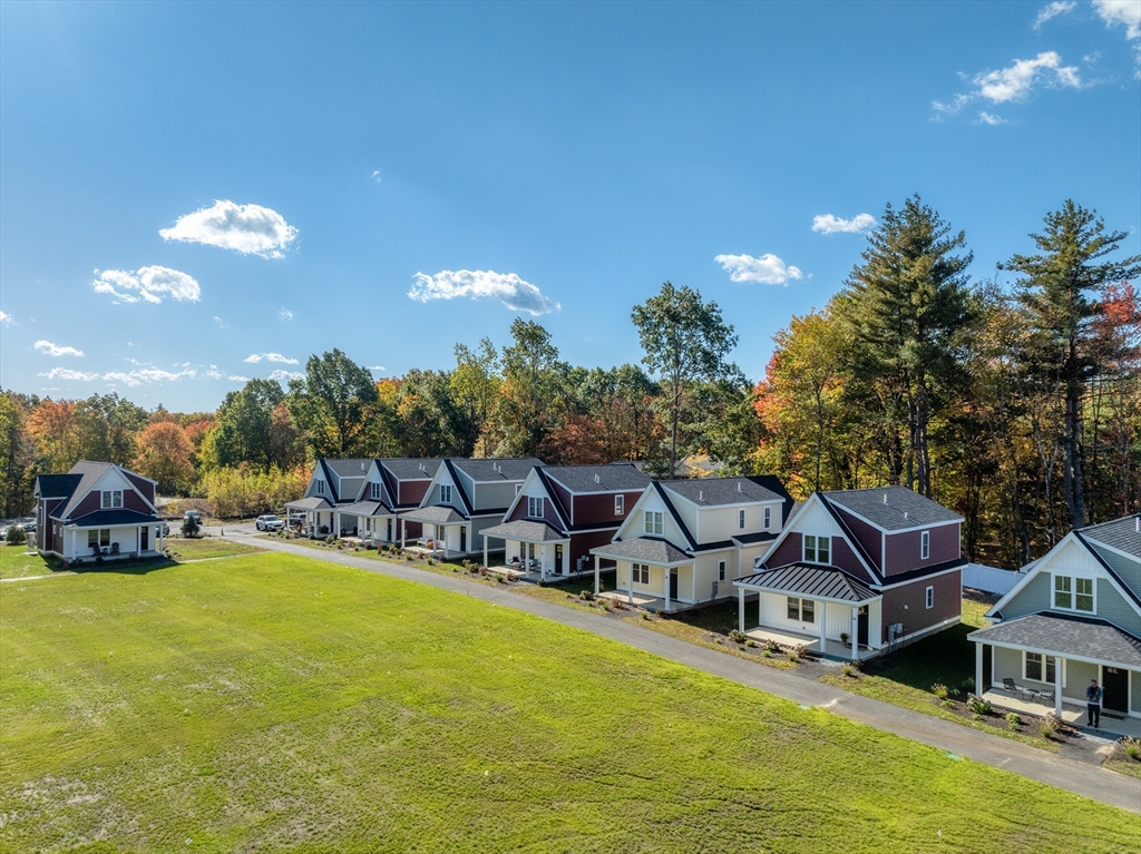30 Cottage Lane Lancaster, MA 01523 - Photo 3 of 16 a aerial view of a house with swimming pool and a yard