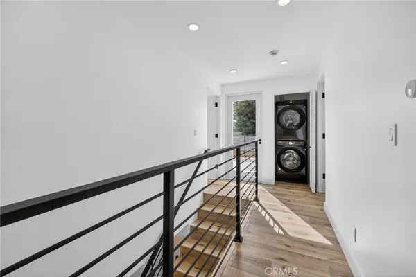 a view of entryway with wooden floor