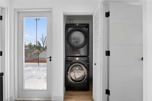 a view of entryway with wooden floor