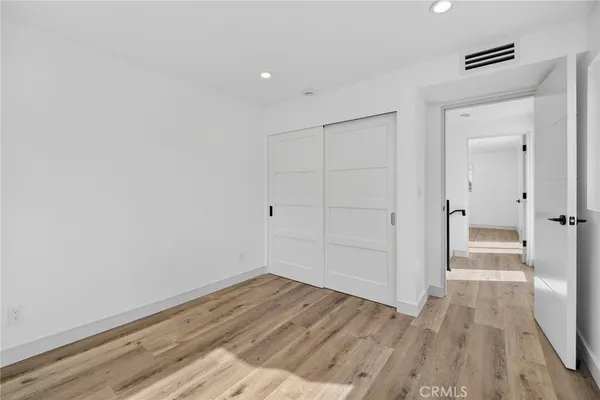 a bathroom with a granite countertop sink a shower and a mirror