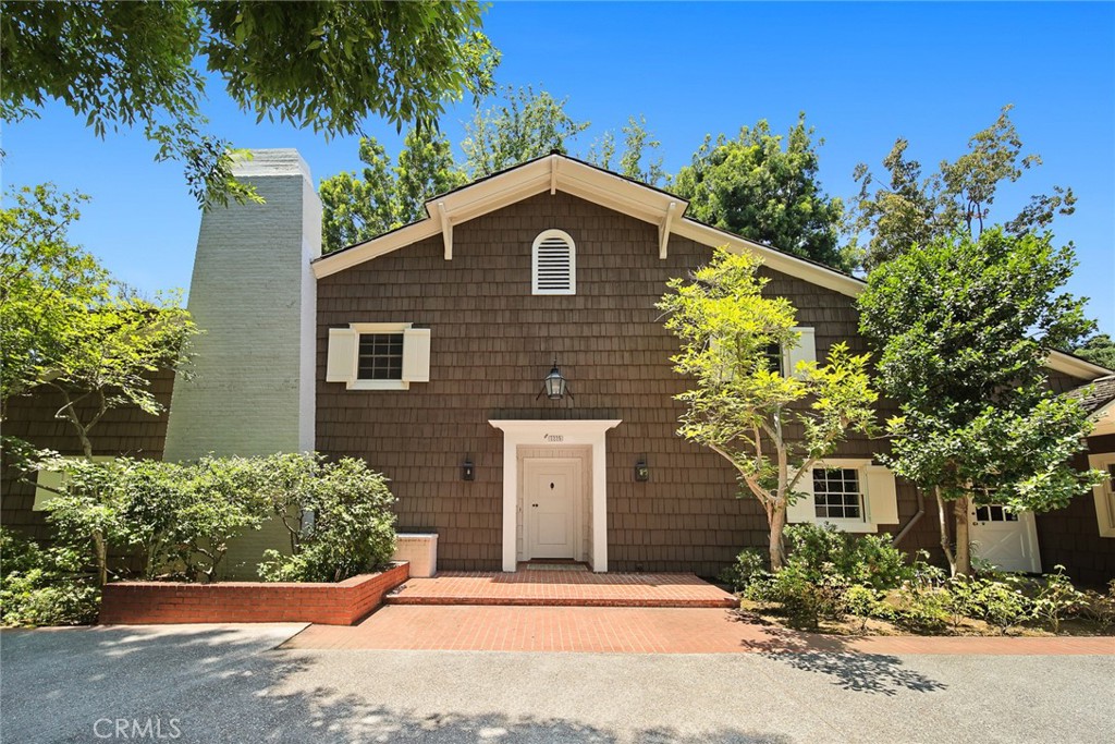 1225 Rodeo Road Arcadia, CA 91006 - Photo 1 of 1 a front view of a house with a garden