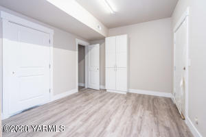 2600 Racquet Lane, Unit 7 Yakima, WA 98902 - Photo 18 of 23 an empty room with wooden floor