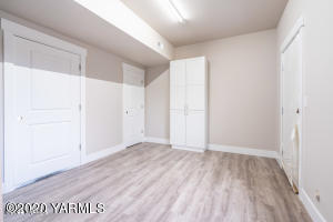 2600 Racquet Lane, Unit 7 Yakima, WA 98902 - Photo 19 of 23 an empty room with wooden floor