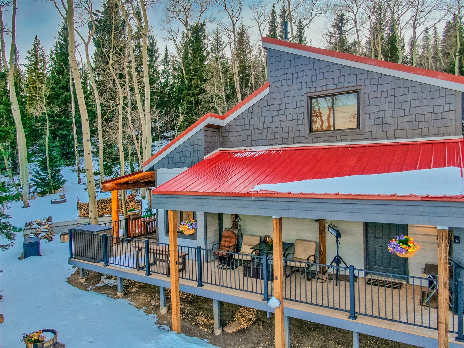 2150 Michigan Hill Road Jefferson, CO 80456 - Photo 50 of 50 a view of a house with a porch and furniture
