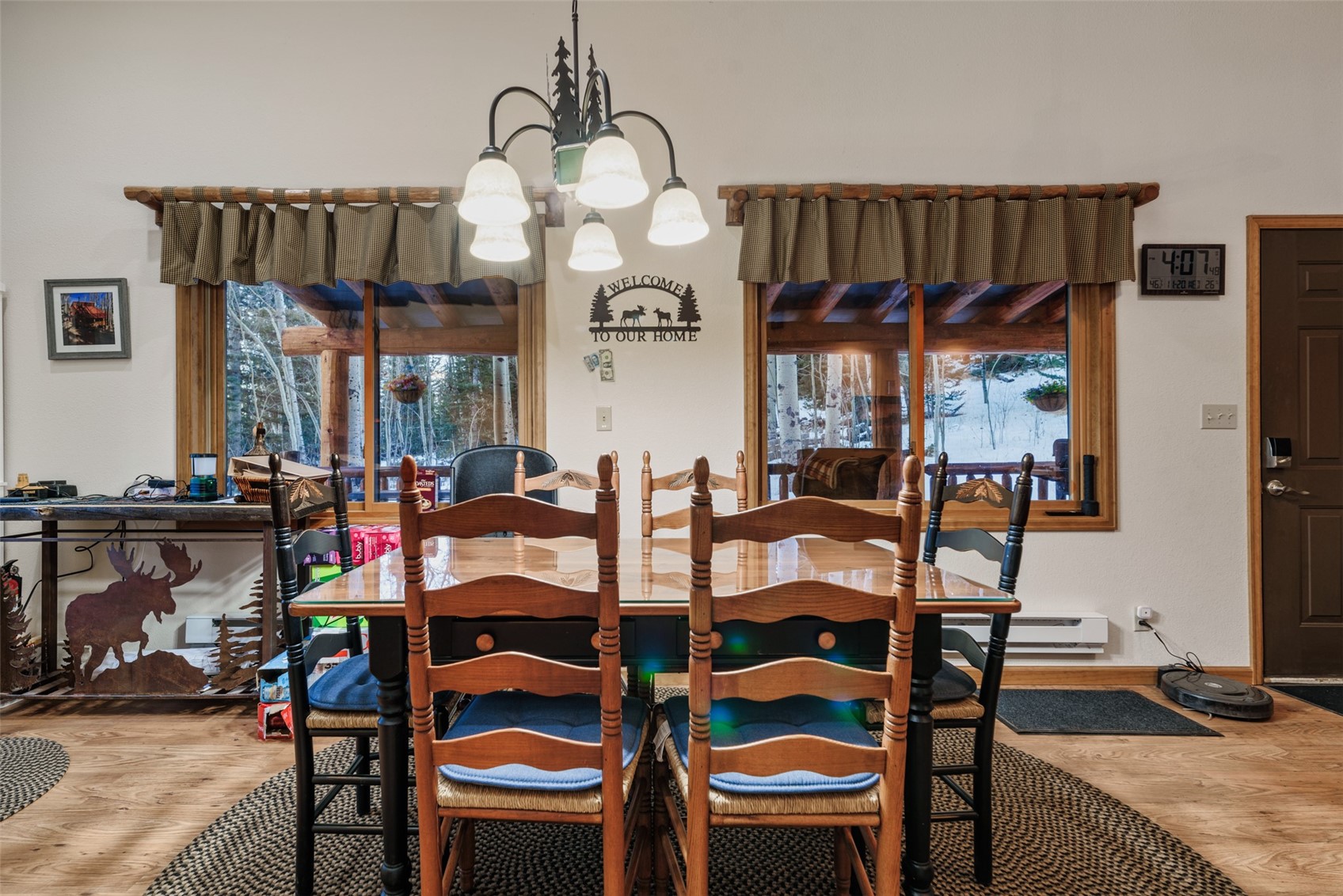 2150 Michigan Hill Road Jefferson, CO 80456 - Photo 7 of 50 a view of a dining room with furniture