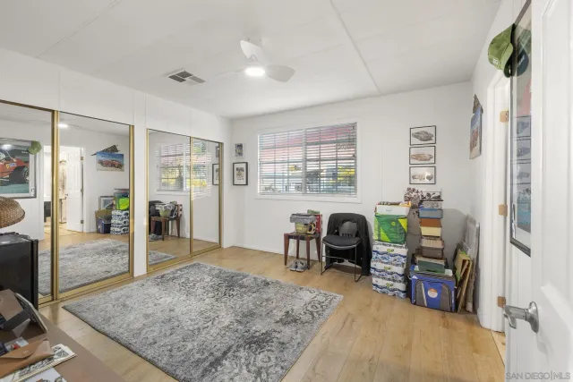 a living room with furniture rug and window