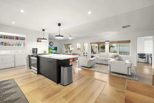 a kitchen with a sink and counter top space