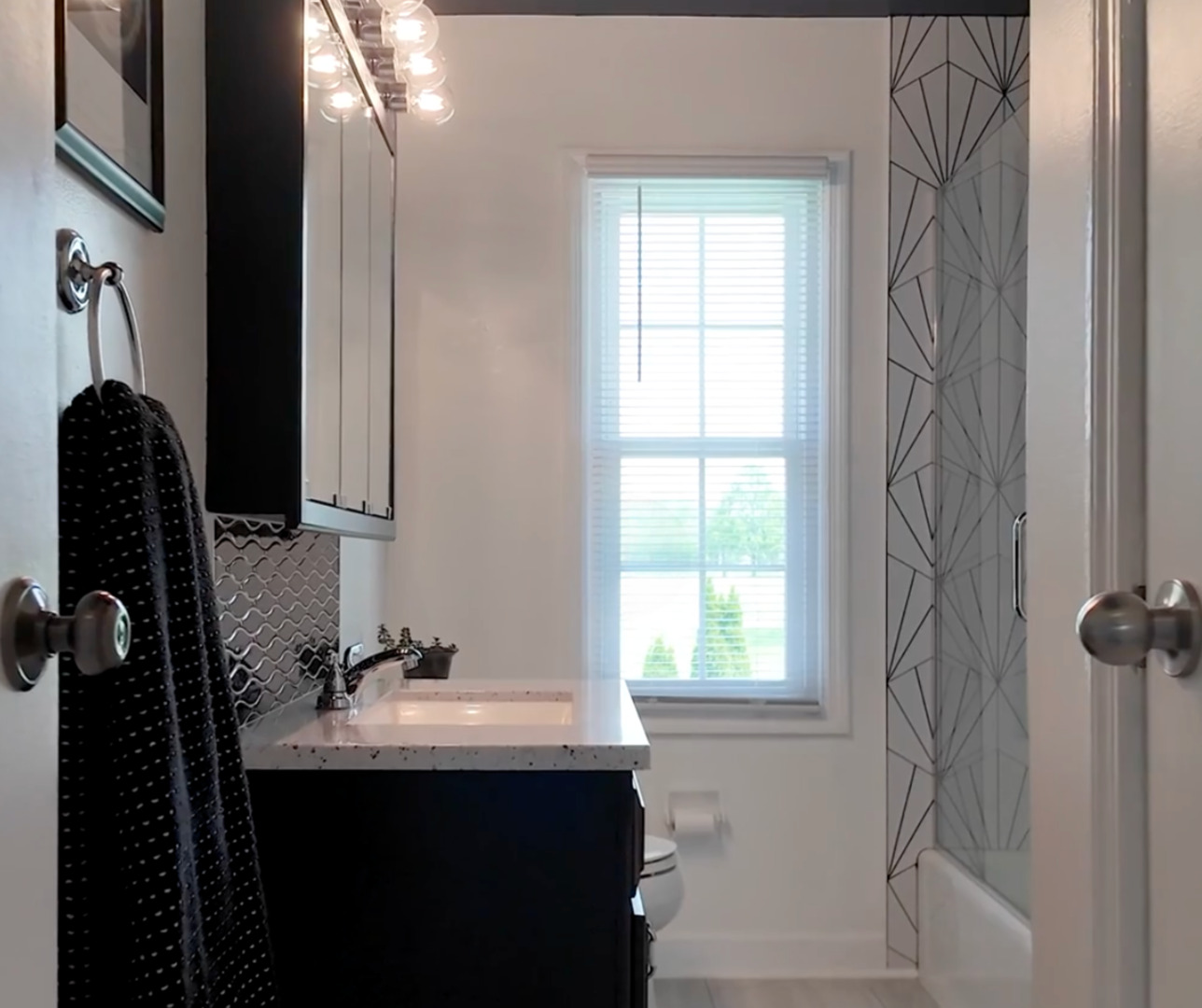 1677 Casa Solana Drive Wheaton, IL 60189 - Photo 15 of 30 a bathroom with a sink and a mirror