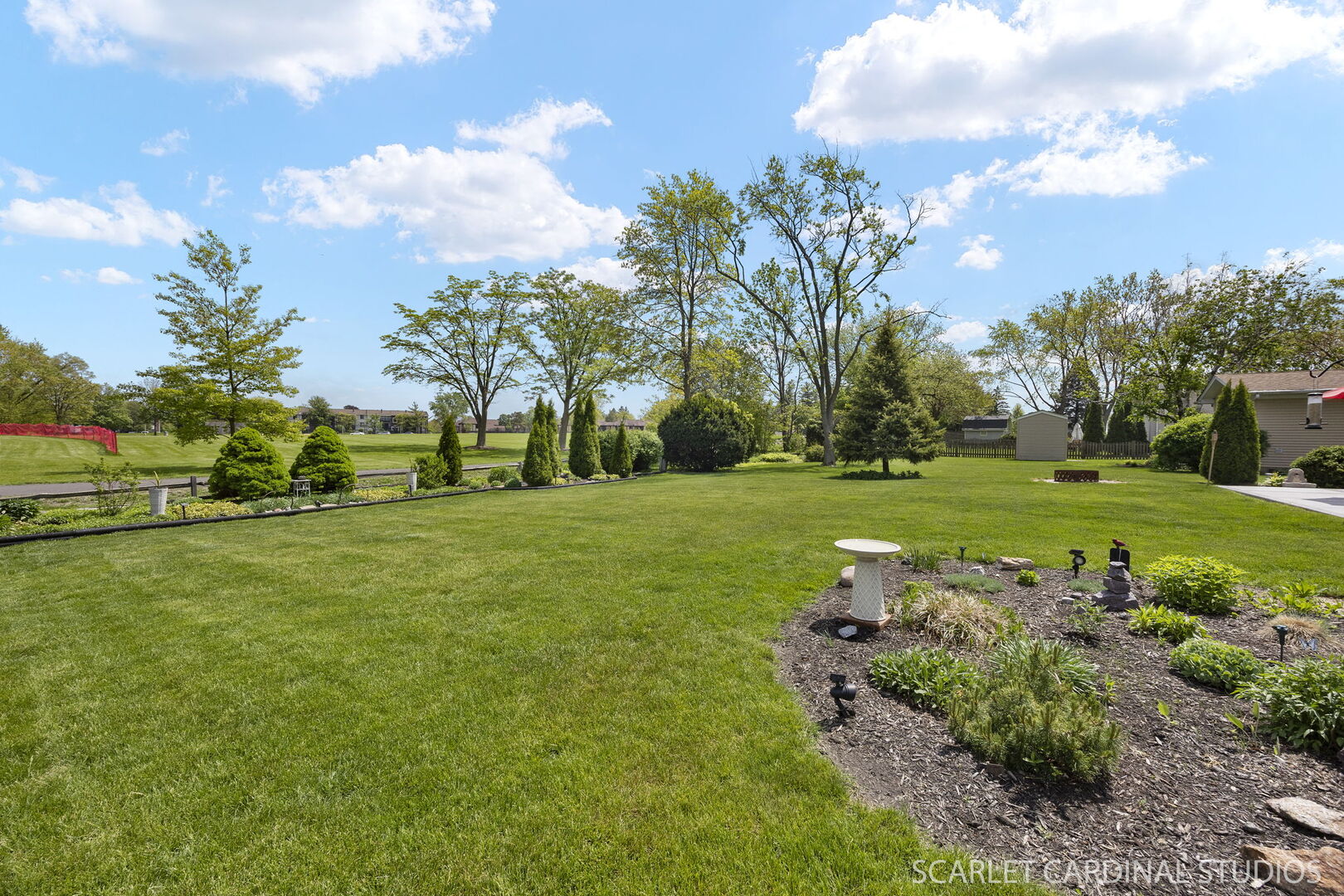 1677 Casa Solana Drive Wheaton, IL 60189 - Photo 24 of 30 a view of a golf course with a lake