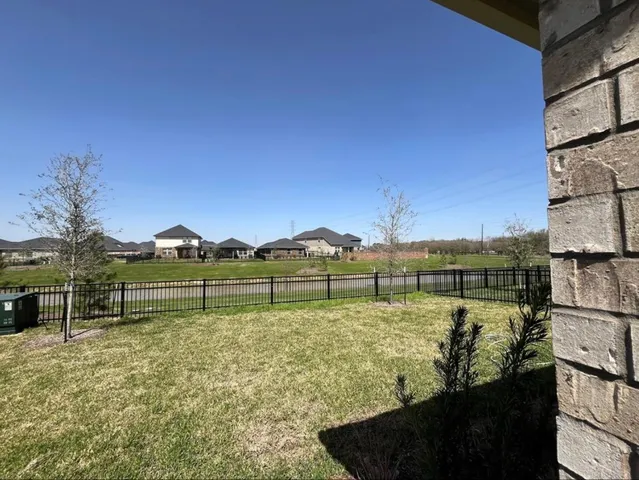 a view of a lake with an outdoor seating