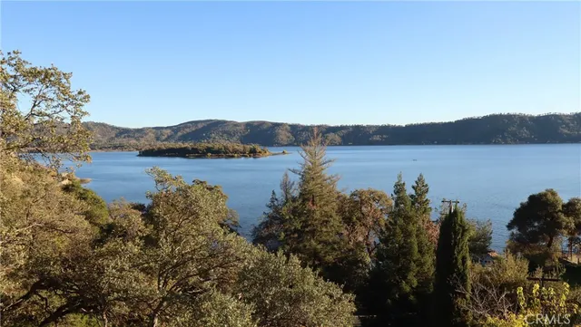 a room with painting and a chandelier