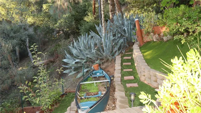 a view of a chairs and table in the patio