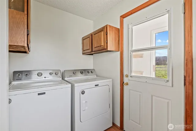 a view of a room that has a window