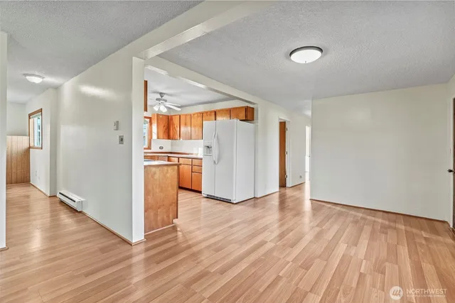 a view of a livingroom with wooden floor