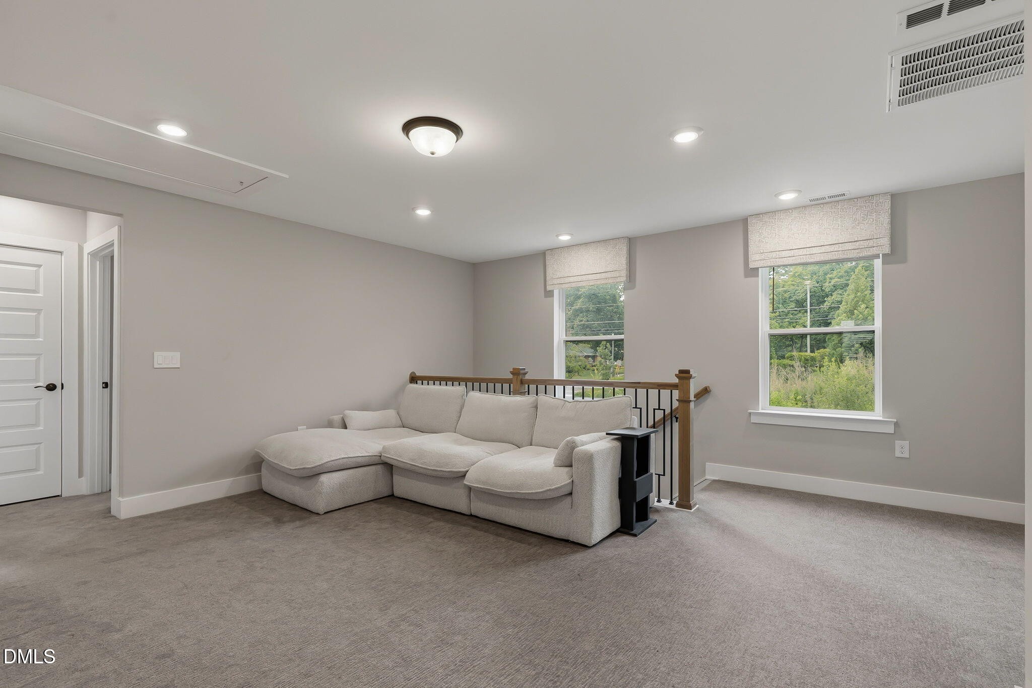 438 Diversity Way Raleigh, NC 27610 - Photo 18 of 33 a living room with furniture and a window
