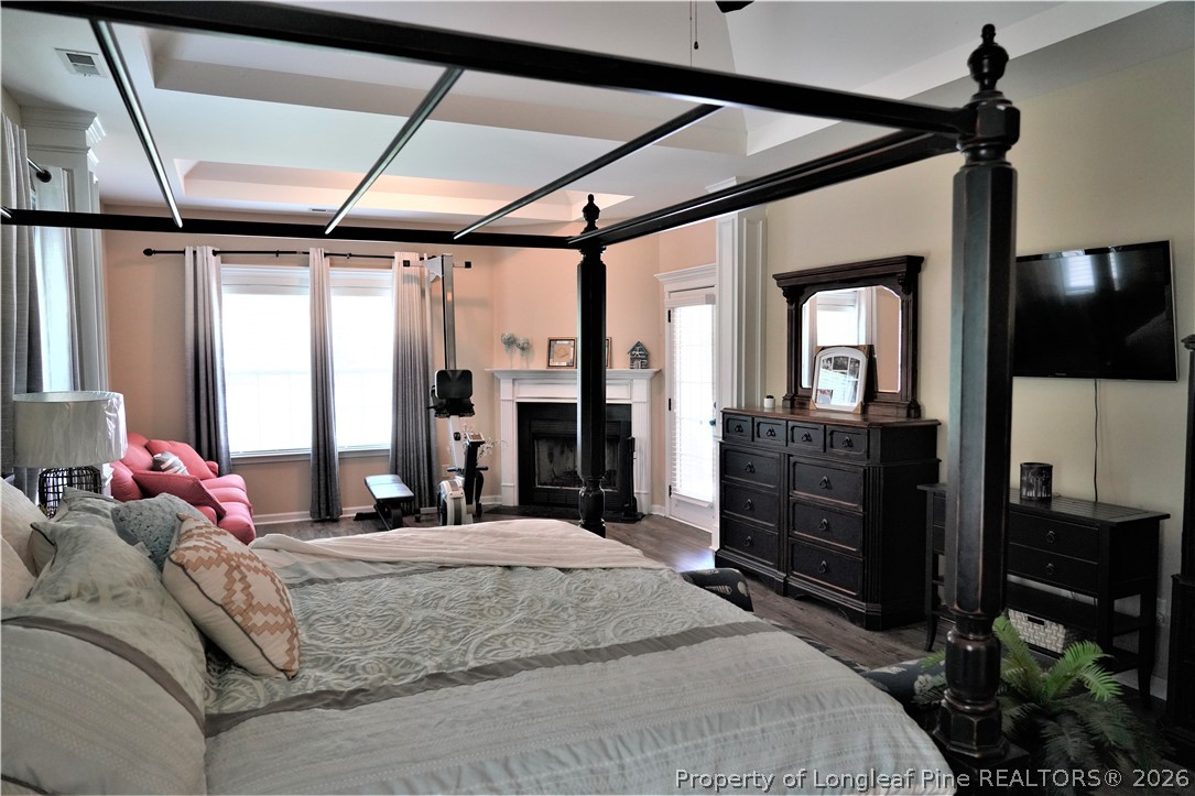 930 Old Vander Road Fayetteville, NC 28312 - Photo 27 of 45 a bed room with a bed and a mirror