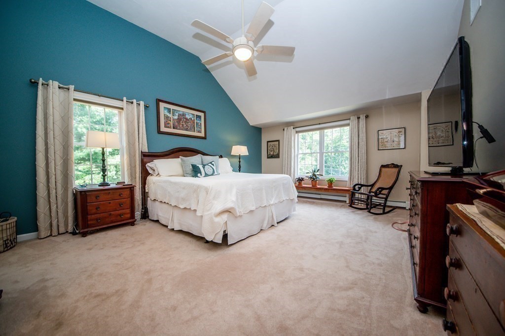 25 Squirrel Island Road Wareham, MA 02576 - Photo 23 of 39 a bedroom with bed and a flat tv screen on dresser
