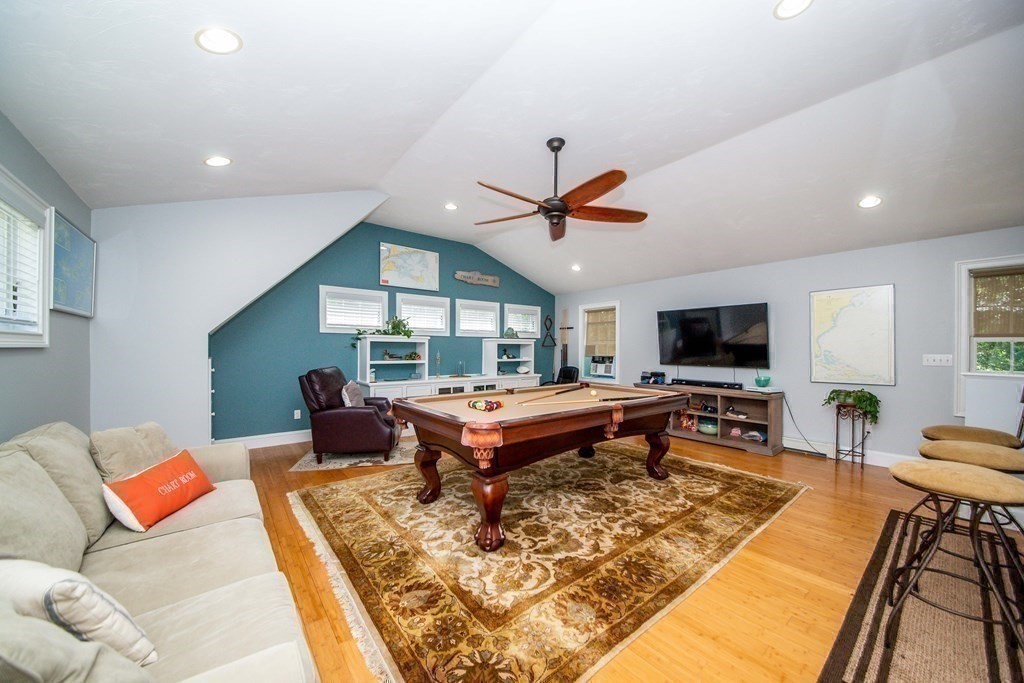 25 Squirrel Island Road Wareham, MA 02576 - Photo 32 of 39 a living room with furniture flat screen tv and a large window