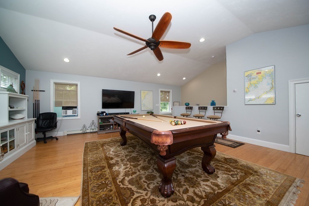 25 Squirrel Island Road Wareham, MA 02576 - Photo 33 of 39 a living room with furniture and a flat screen tv
