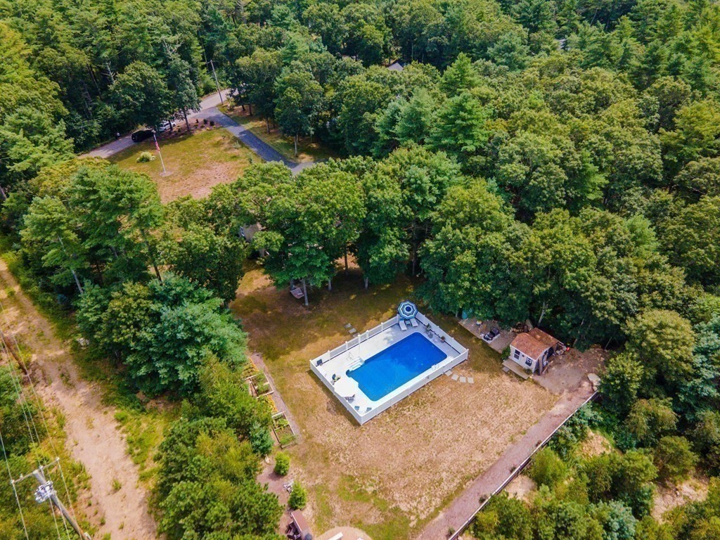 25 Squirrel Island Road Wareham, MA 02576 - Photo 38 of 39 an aerial view of a house with a yard and swimming pool
