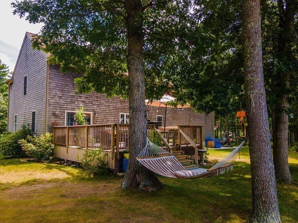25 Squirrel Island Road Wareham, MA 02576 - Photo 4 of 39 a view of a house with swimming pool next to a yard