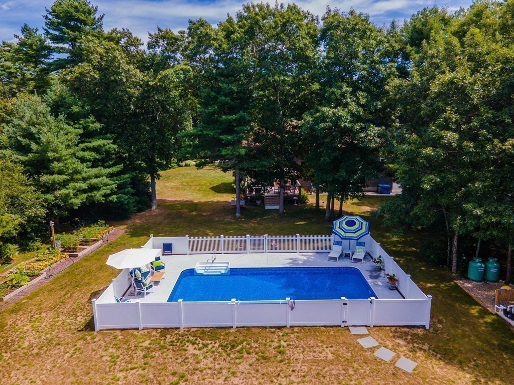25 Squirrel Island Road Wareham, MA 02576 - Photo 7 of 39 a view of a yard with chairs
