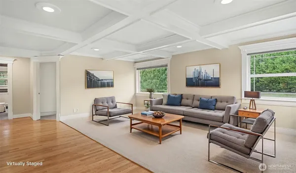a living room with furniture and a window