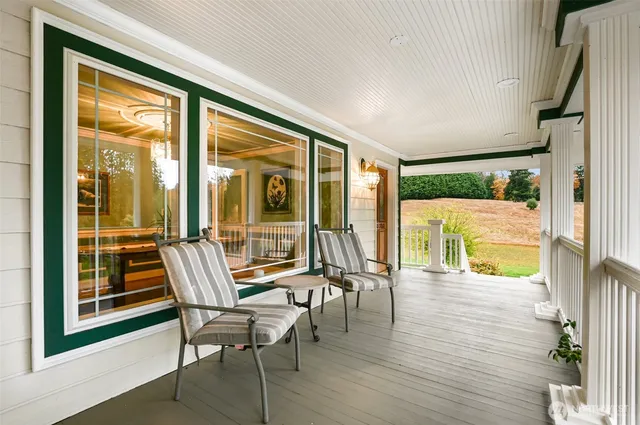a view of a entryway door with wooden floor