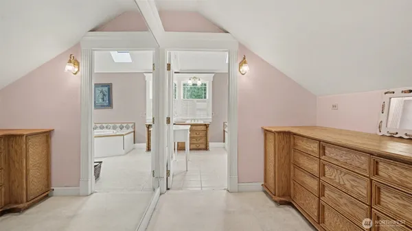 a bathroom with a sink and mirror