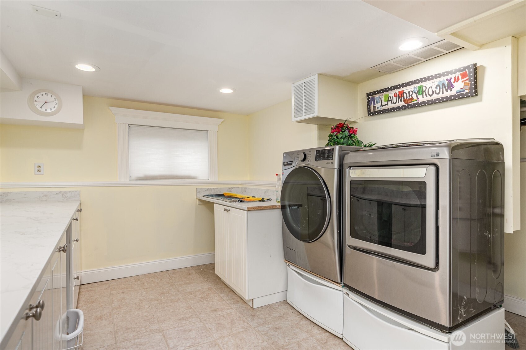 18530 Southeast 145th Street Renton, WA 98059 - Photo 25 of 40 a utility room with dryer and washer