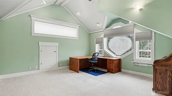 an entryway and a livingroom with furniture