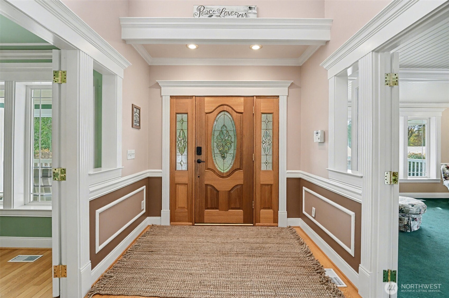18530 Southeast 145th Street Renton, WA 98059 - Photo 6 of 40 a view of a entryway door with wooden floor