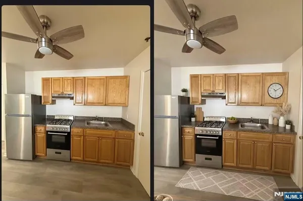 a kitchen with cabinets stainless steel appliances and a window