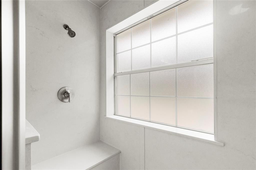 2917 Harlow Road Commerce, TX 75428 - Photo 21 of 40 a bathroom with a window