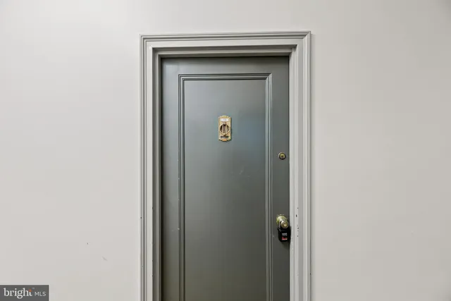 a view of hallway with windows