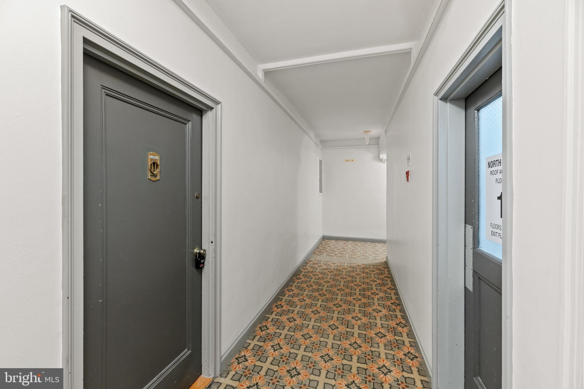 3051 Idaho Avenue Northwest, Unit 119 Washington, DC 20016 - Photo 29 of 36 a view of hallway with windows