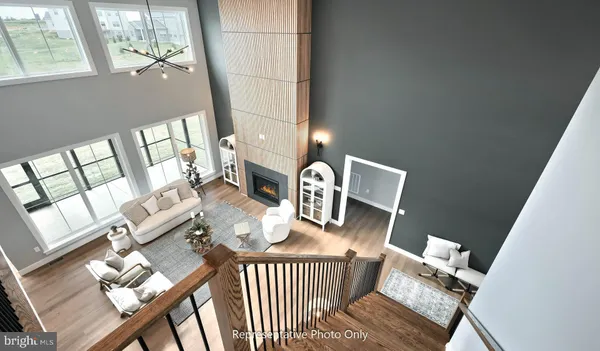 a bathroom with a double vanity sink toilet and shower