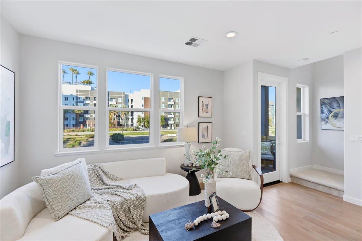 1910 Joshua Tree Circle Milpitas, CA 95035 - Photo 12 of 43 a living room with furniture potted plant and window