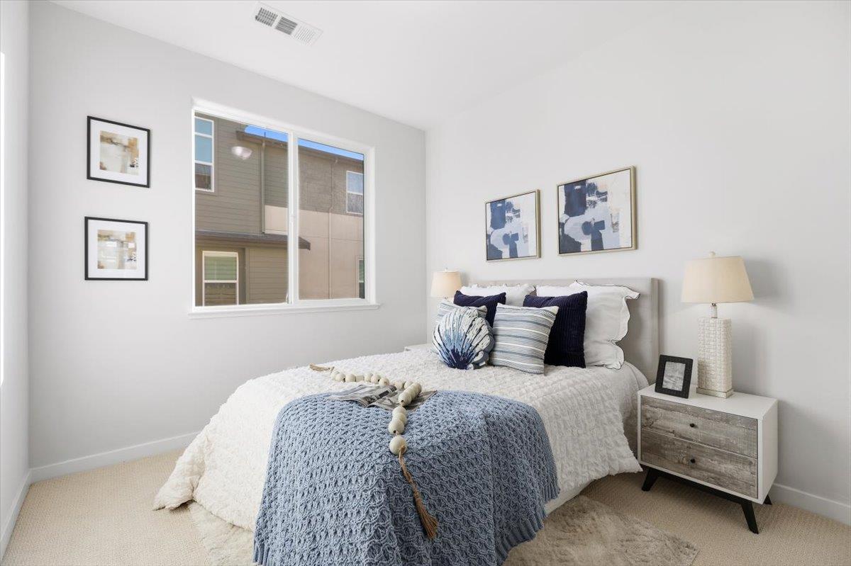 1910 Joshua Tree Circle Milpitas, CA 95035 - Photo 16 of 43 a bedroom with bed and a window