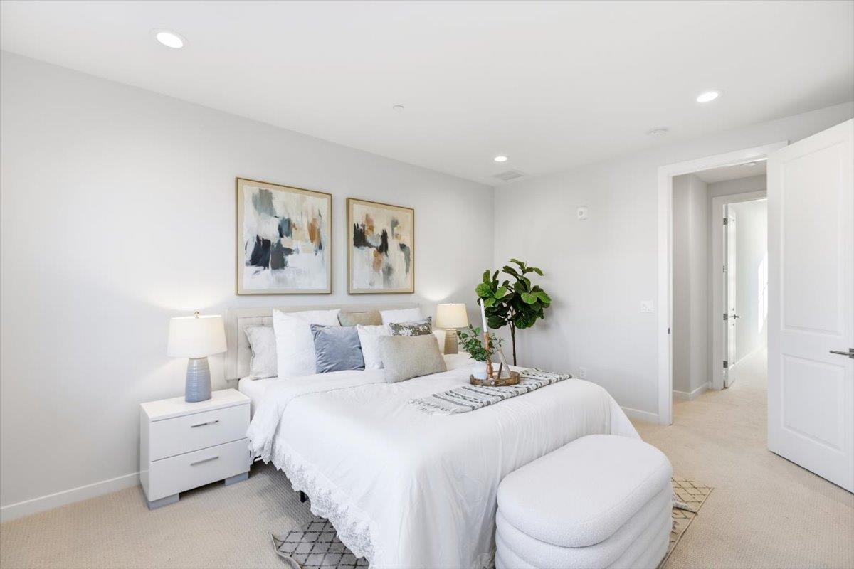 1910 Joshua Tree Circle Milpitas, CA 95035 - Photo 19 of 43 a bedroom with a bed and a painting on the wall