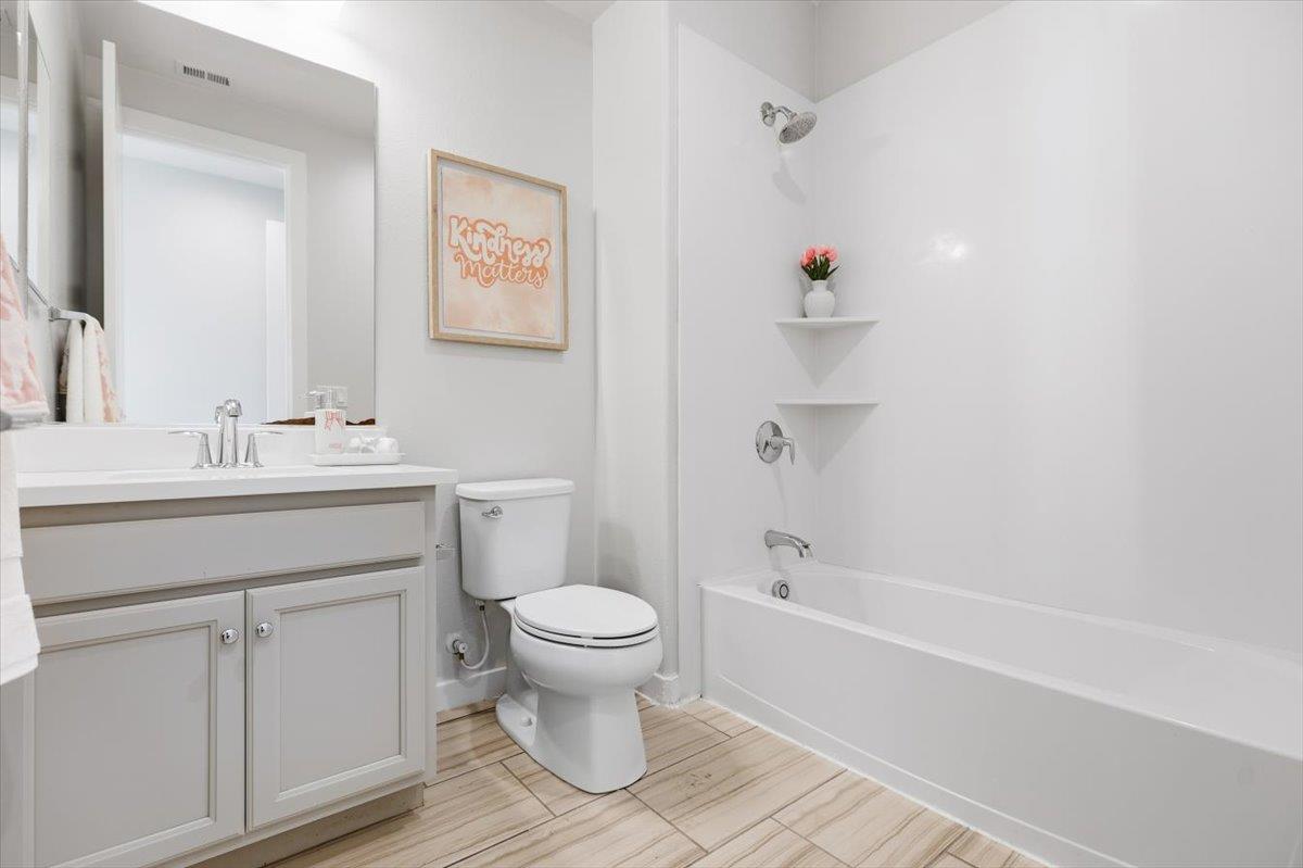 1910 Joshua Tree Circle Milpitas, CA 95035 - Photo 25 of 43 a bathroom with a sink toilet and shower