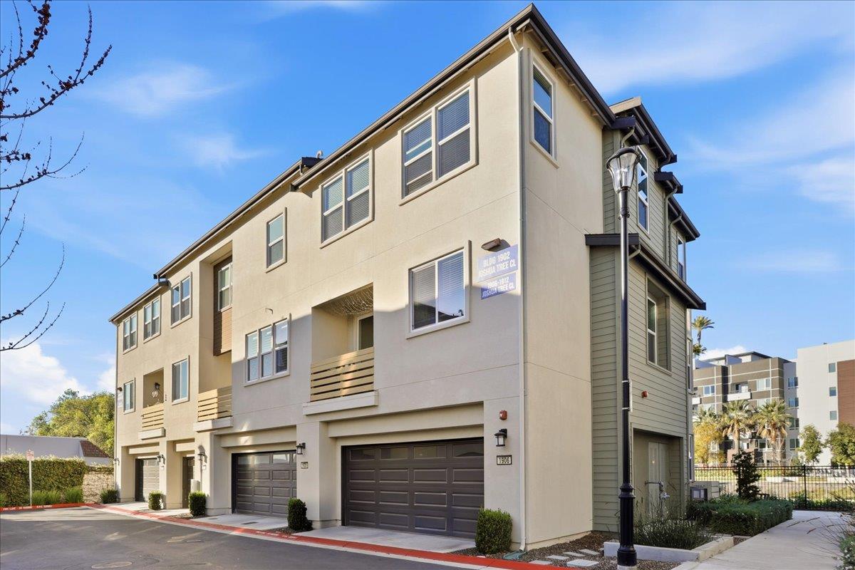1910 Joshua Tree Circle Milpitas, CA 95035 - Photo 31 of 43 a front view of a building with a yard