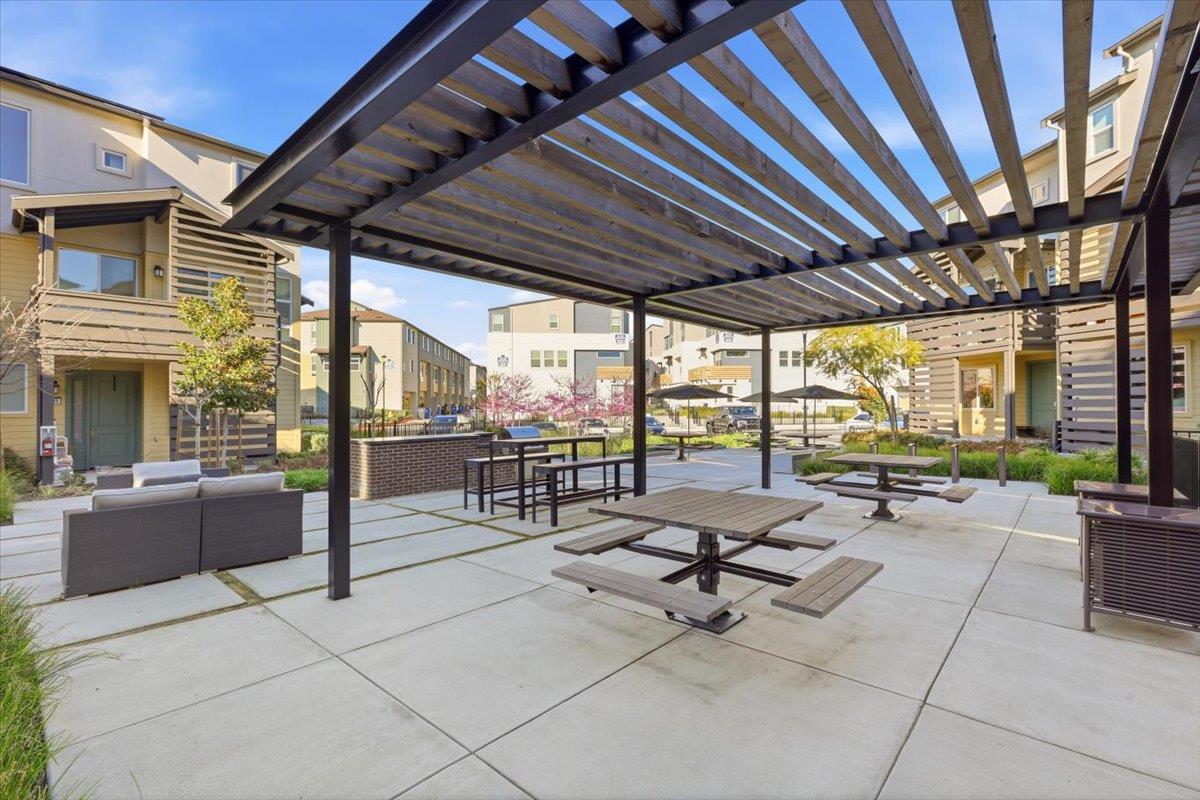 1910 Joshua Tree Circle Milpitas, CA 95035 - Photo 38 of 43 a building outdoor space with patio furniture and potted plants