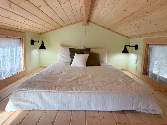 a view of a hallway with washer and dryer