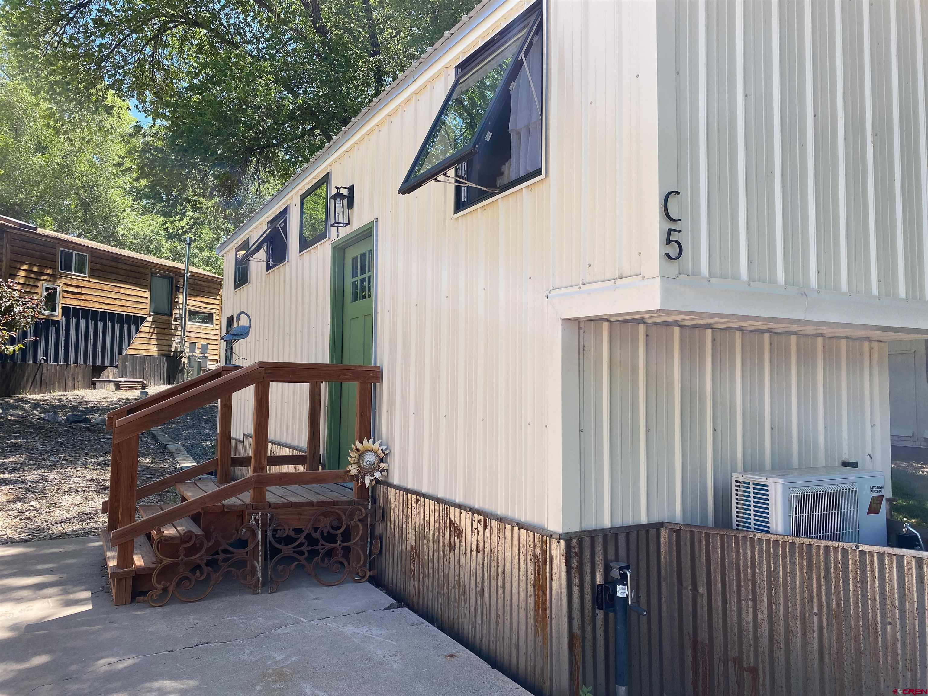 485 Florida Road, Unit C5 Durango, CO 81301 - Photo 16 of 40 a view of a house with wooden fence