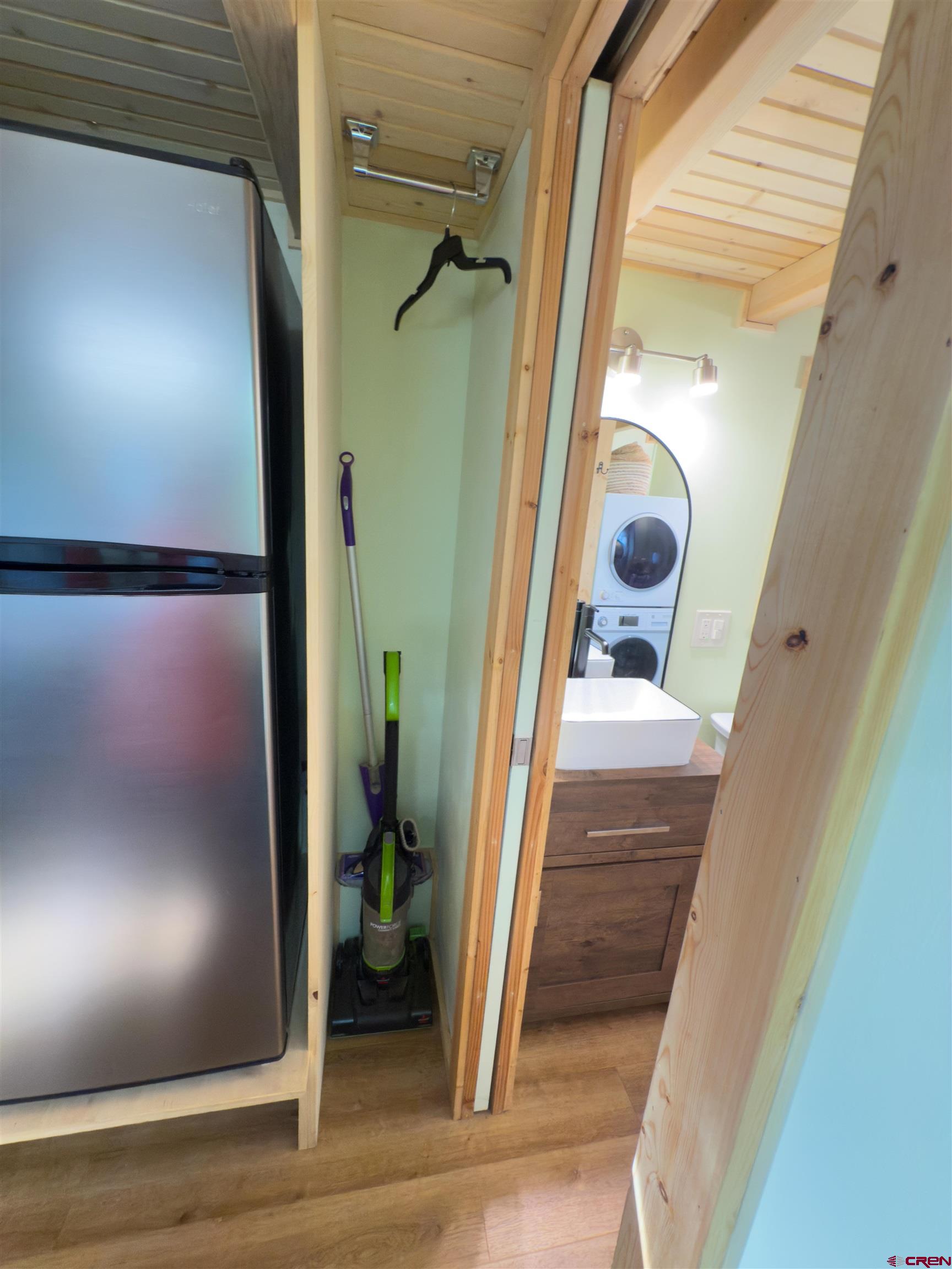 485 Florida Road, Unit C5 Durango, CO 81301 - Photo 20 of 40 a view of a hallway to a livingroom and a floor to ceiling window
